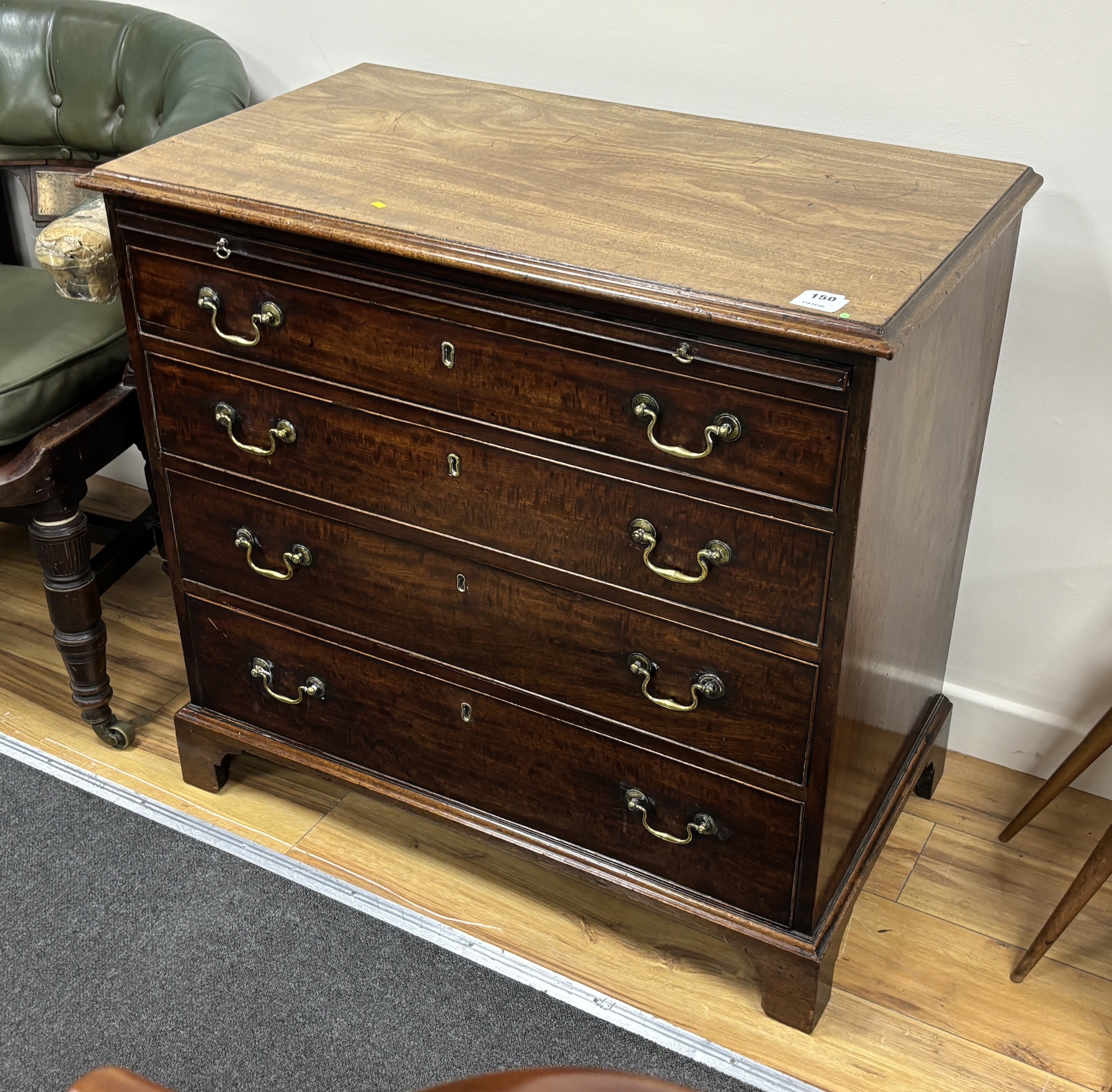 A George III mahogany straight front chest, fitted four long drawers with slide, width 87cms, depth 49cm, height 81cm